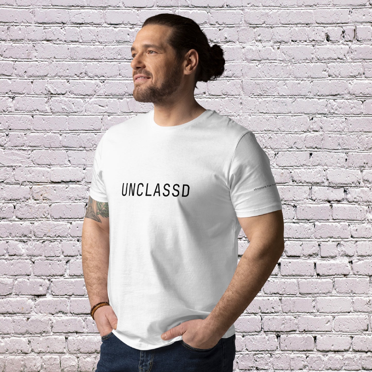 Male Model wearing UNCLASSD CORE Sand Tee during dance or rollerskate flow practice - face