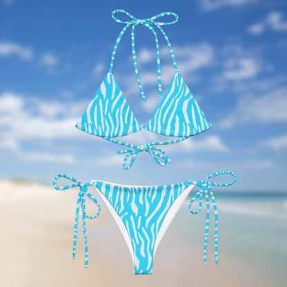 Front neon blue zebra triangle bikini with adjustable tie straps by Unclassd.