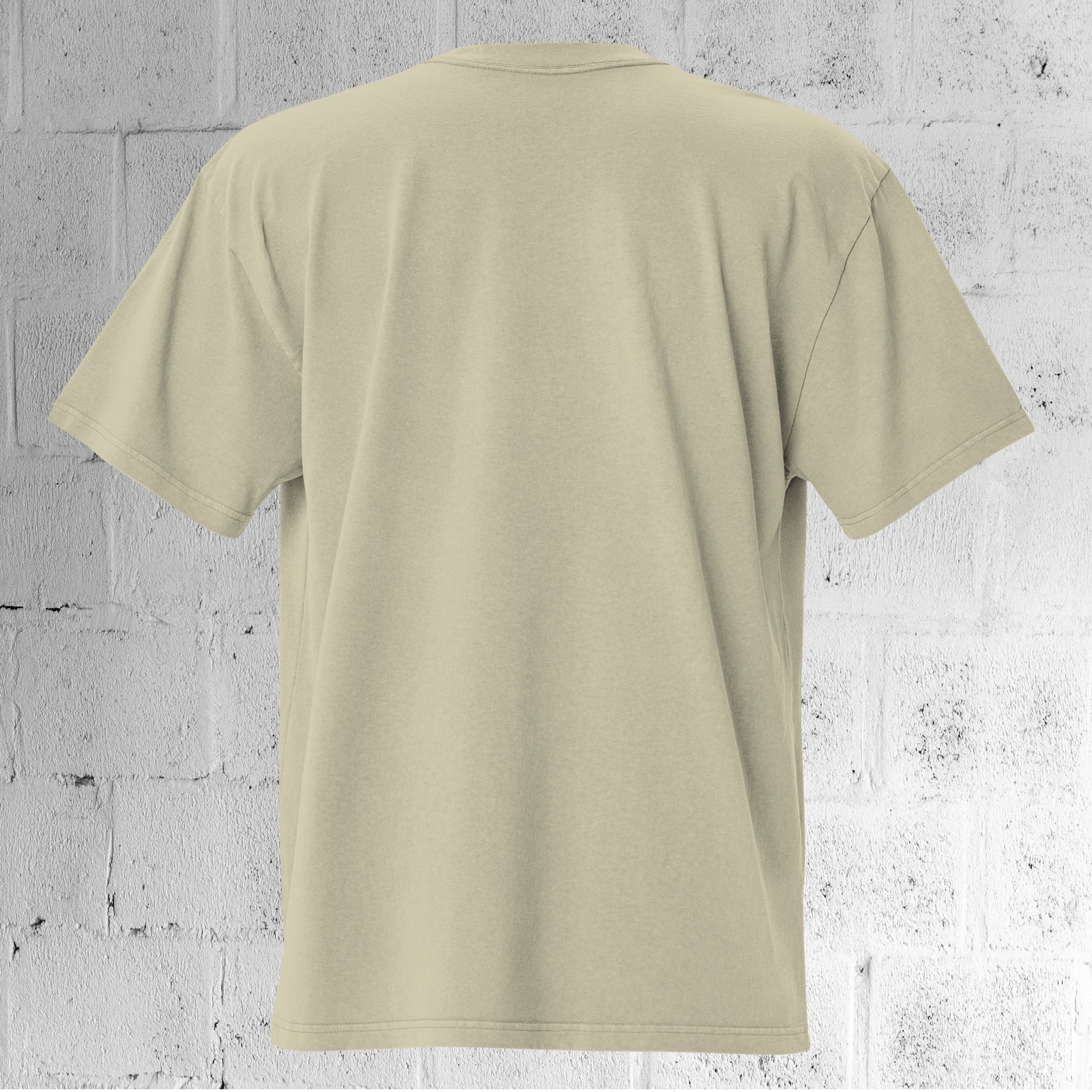 Back view of the UNCLASSD CORE Oversized Tee in faded eucalyptus sage showing dropped shoulders and oversized fit.
