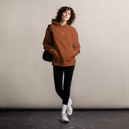 Women’s model wearing UNCLASSD Clay CORE Oversized Hoodie — dance & roller practice