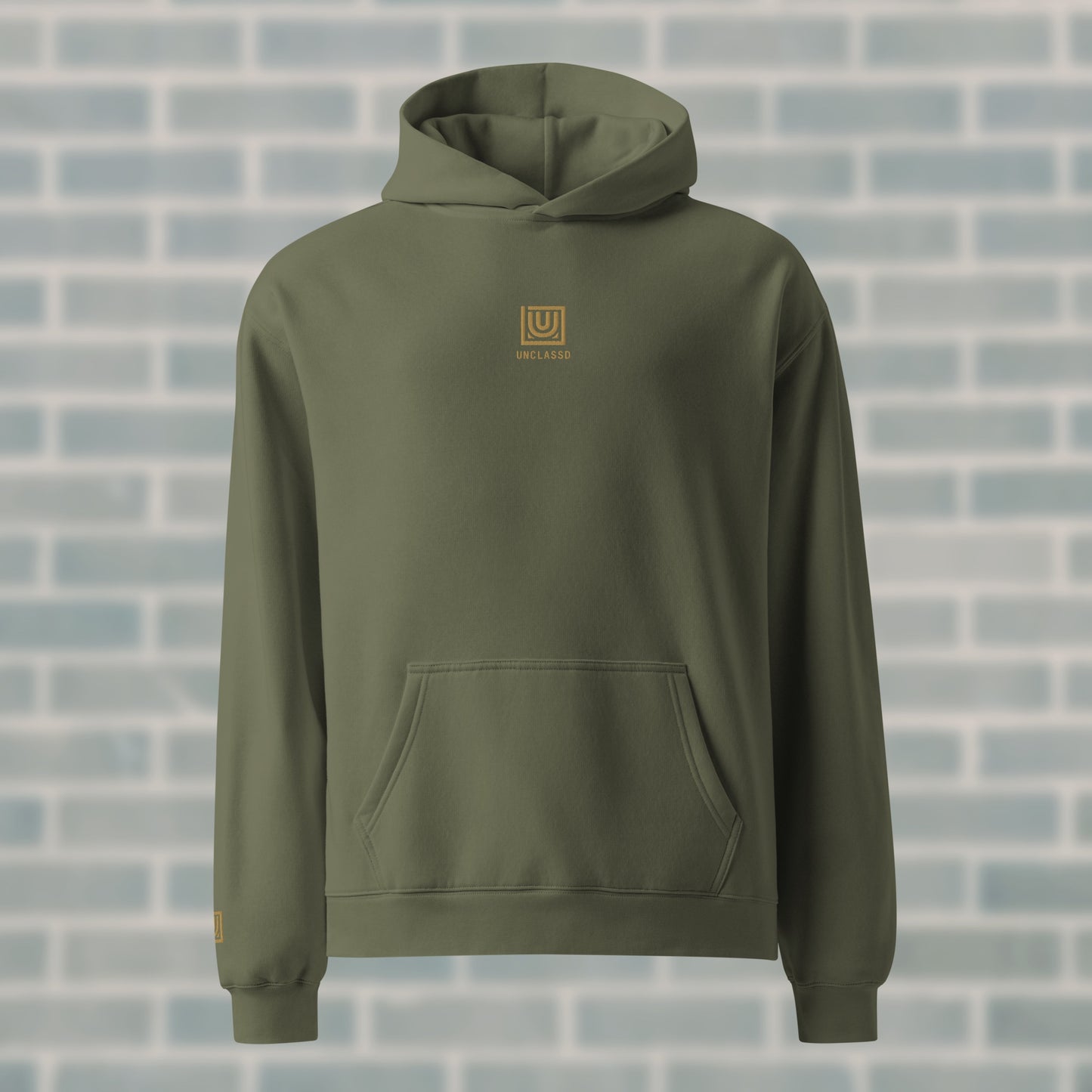 UNCLASSD Cypress Hoodie — premium oversized dance hoodie with centered gold embroidery and “GROUND MOVEMENT, GROUND MIND” mantra. Designed for dancers, rollerskaters, and movement training.