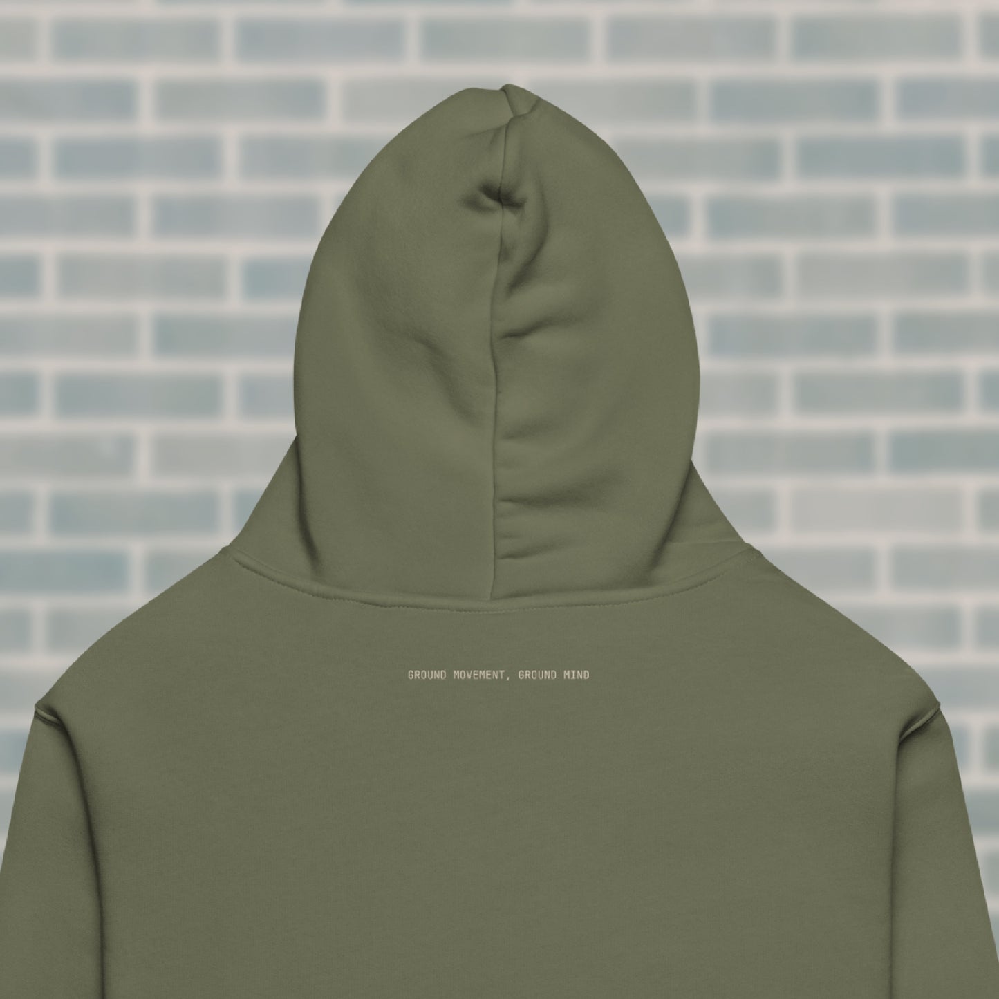 Close-up of the “GROUND MOVEMENT, GROUND MIND” mantra on the Cypress UNCLASSD Hoodie — earth-led guidance for dancers, rollerskaters, and mindful movers.
