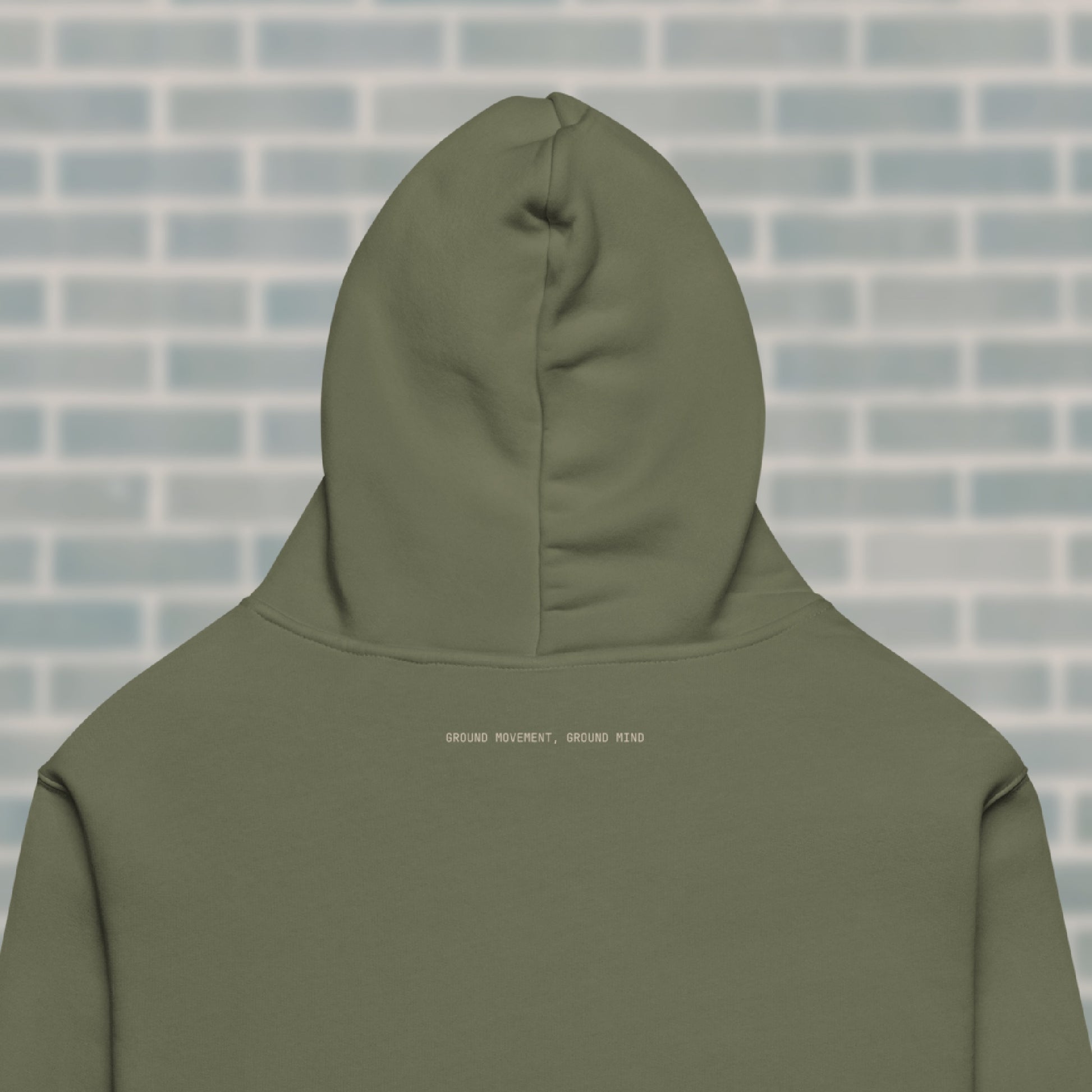 Close-up of the “GROUND MOVEMENT, GROUND MIND” mantra on the Cypress UNCLASSD Hoodie — earth-led guidance for dancers, rollerskaters, and mindful movers.
