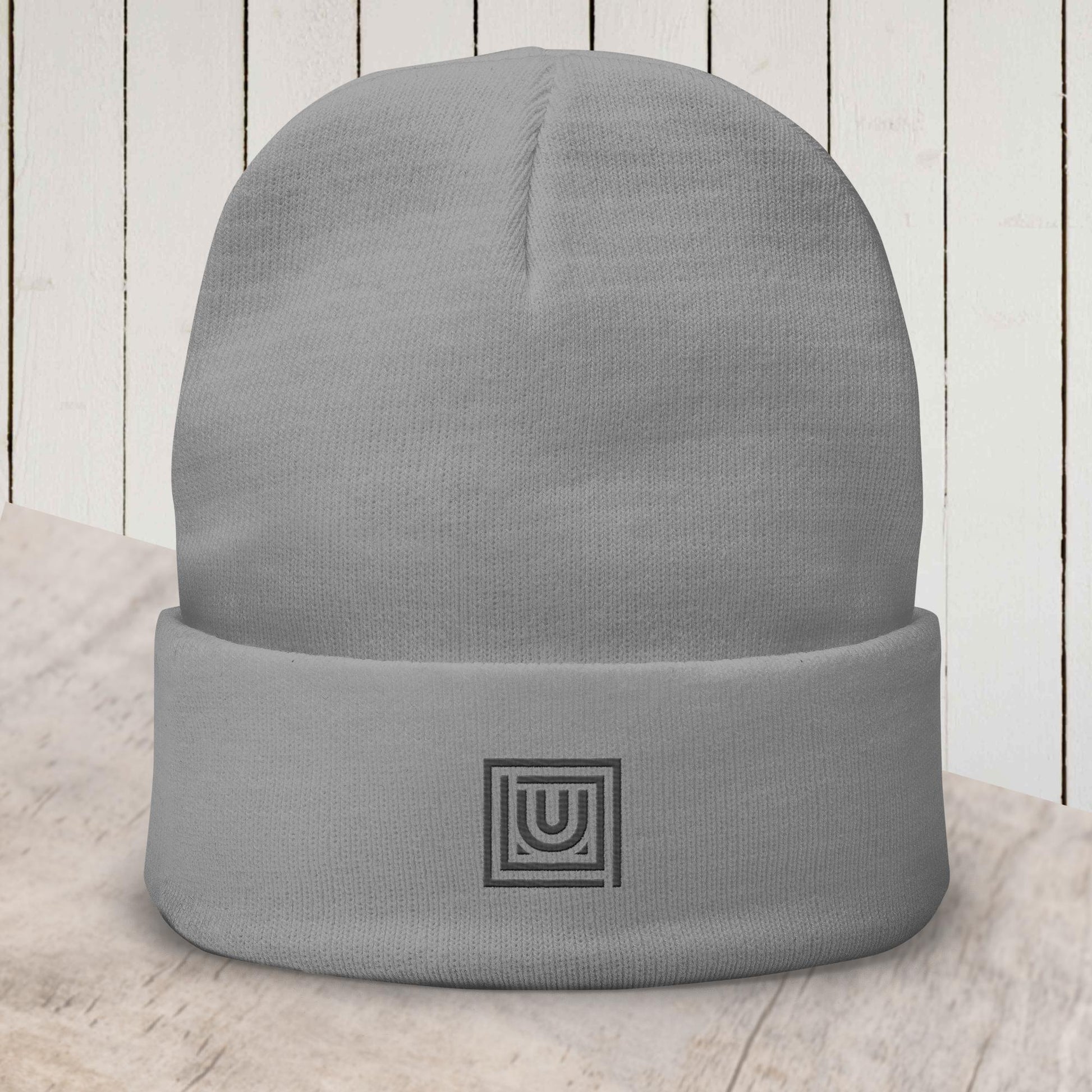 Grey beanie with embroidered monogram designed for dance and studio wear