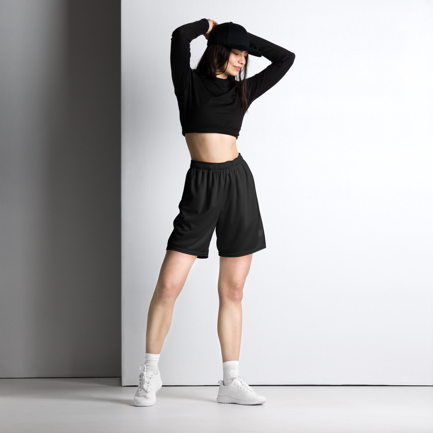 Model wearing black core mesh dance sport short for dance and movement training