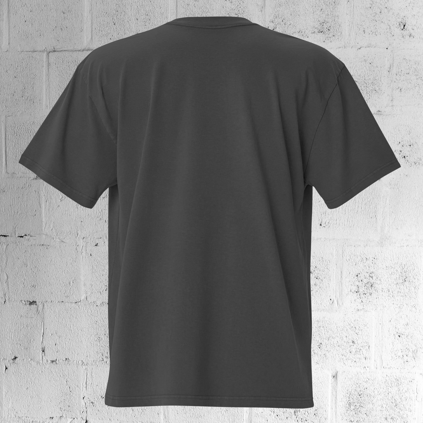 Back view of the UNCLASSD CORE Oversized Tee showing dropped shoulders and oversized fit.