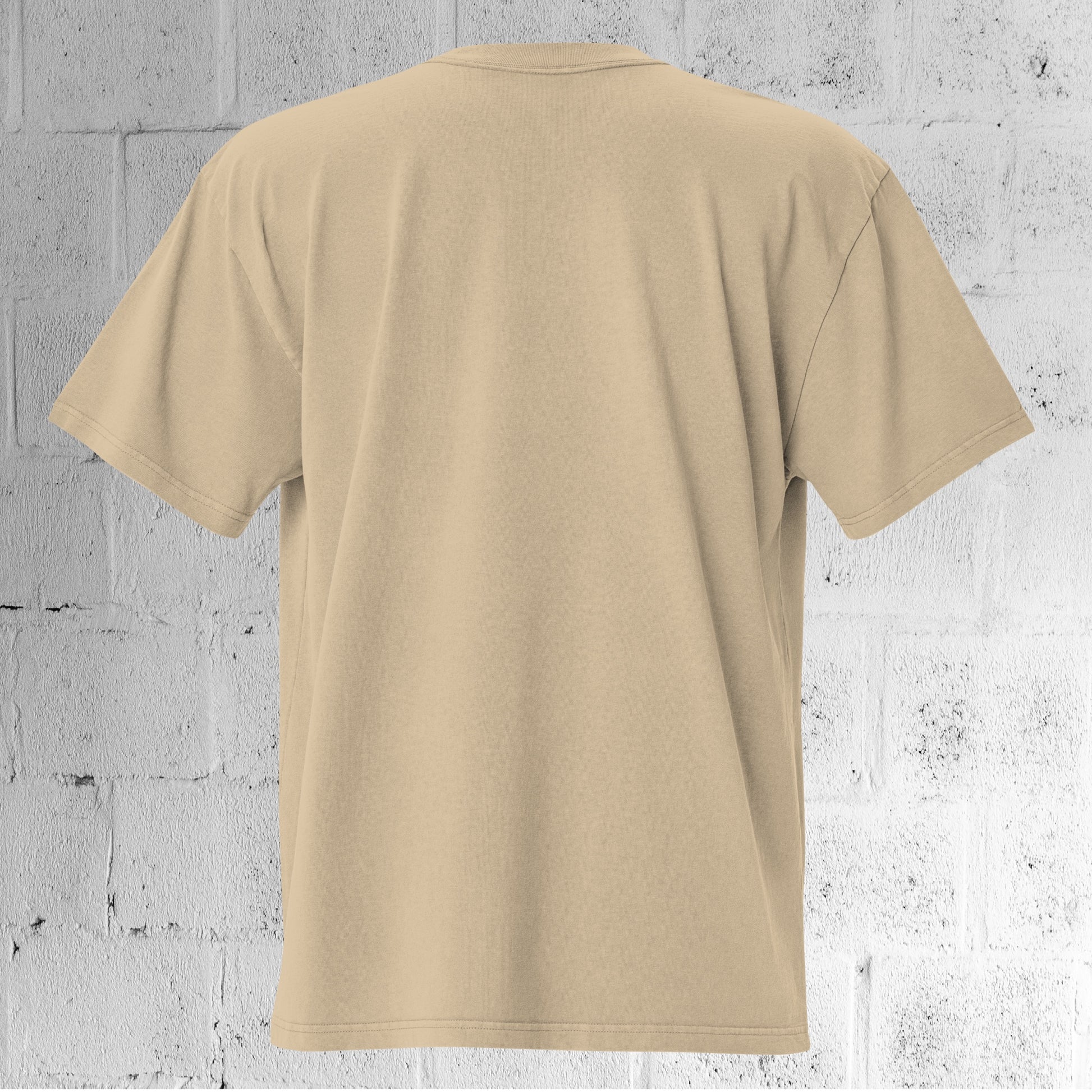 Back view of the UNCLASSD CORE Oversized Tee faded khaki/sand showing dropped shoulders and oversized fit.
