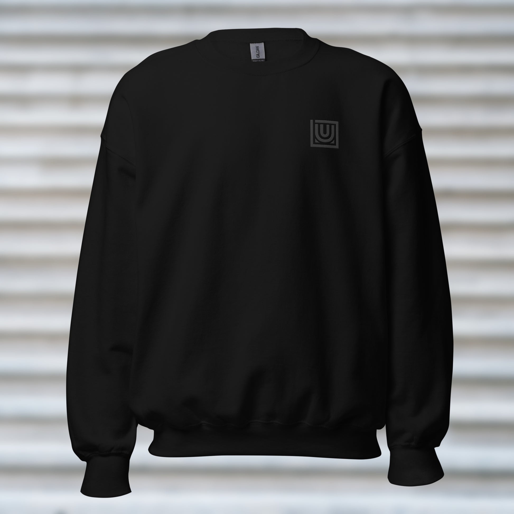 Front view of UNCLASSD CORE Black Crewneck with left-chest embroidery for dancers