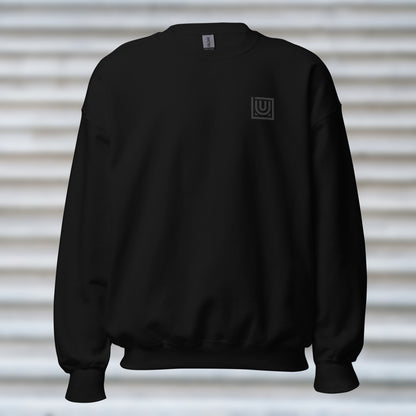 Front view of UNCLASSD CORE Black Crewneck with left-chest embroidery for dancers