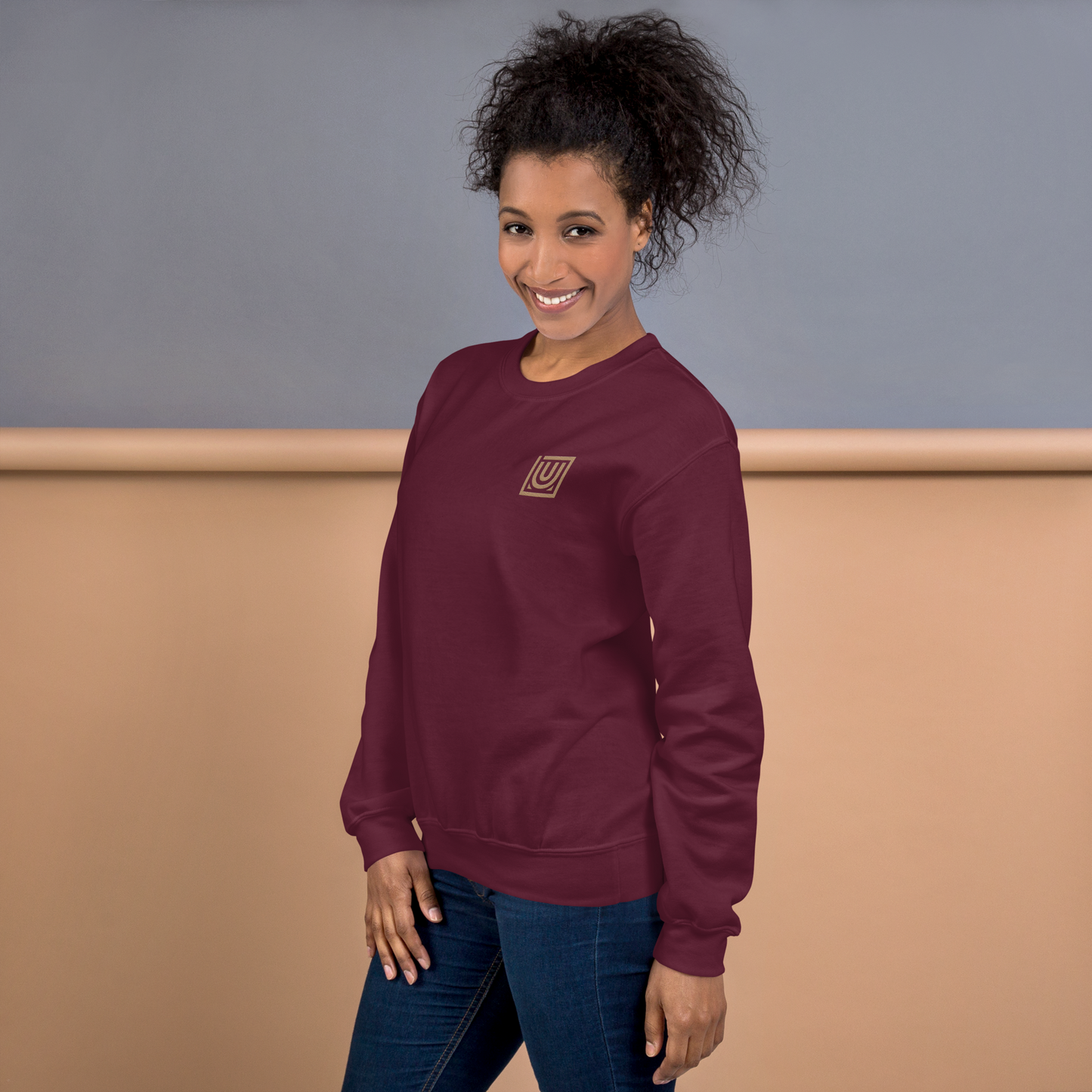 Model wearing CORE Maroon Crewneck for dance or rollerskate practice - female front 