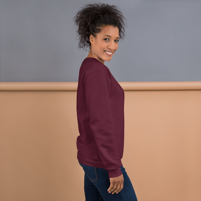 Model wearing CORE Maroon Crewneck for dance or rollerskate practice - female side 